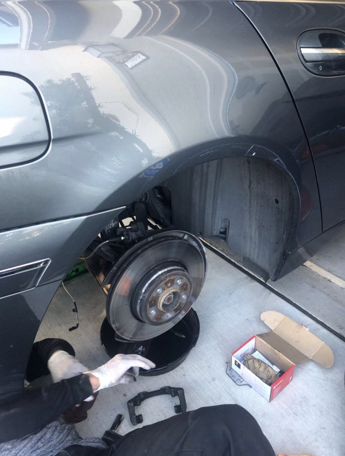 Brake work in progress at an Atlanta home garage